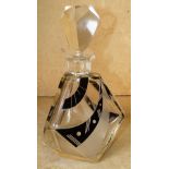 An Art Deco Cut Glass Triangular Shaped Decanter with stopper having black decoration (slight chip