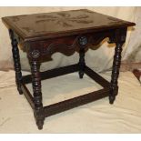 A Victorian Carved Rectangular Shaped Occasional Table having leaf decoration on round turned stems