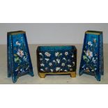 A Pair of Victorian Blue Glass Small Dwarf Candlesticks having multicoloured enamelled floral,