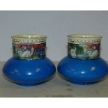 A Pair of L&Sons Ltd Small Bulbous Thin Neck Vases on blue ground having multicoloured swan and