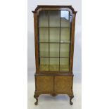 A reproduction walnut display cabinet, w