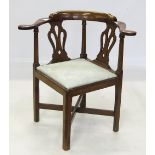 An antique mahogany corner chair, with t