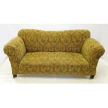 An Edwardian upholstered two seat settee