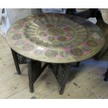 A circular Benares style tray, decorated