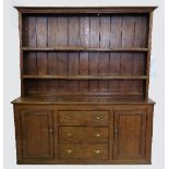 A 19th century elm dresser, with Delft r