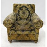 A late 19th century fireside armchair, h