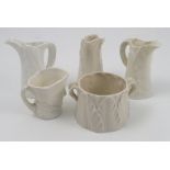 Three Royal Worcester blank leaf moulded jugs, heights 3.5ins, together with a Royal Worcester blank