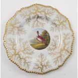 A Flight, Barr and Barr Worcester plate, decorated with central panel of a fabulous bird to a