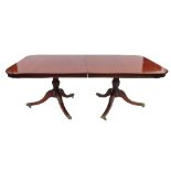 A mahogany twin pedestal dining table, r