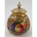 A Royal Worcester covered pot pourri, the quarter lobed body decorated with fruit to a mossy