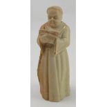 A Royal Worcester blush ivory candle snuffer, modelled as a monk, dated 1915, height 4.75ins