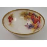 A Royal Worcester bowl, decorated to the interior and exterior with autumnal fruits and leaves, by