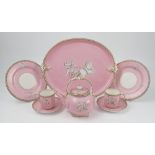 A Graingers Worcester part tea service, printed with classical figures to a pink ground,