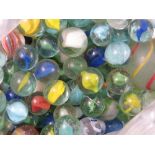 A quantity of various sized glass marble