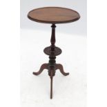 A 19th century mahogany circular occasional table, with small dish tray below, raised on a tripod