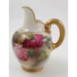 A Royal Worcester flat back jug, decorated with red and pink roses, dated 1914, shape number 1094,