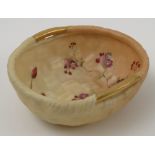 A Royal Worcester blush ivory bowl, with basket weave and flower decoration, dated 1912, G441,
