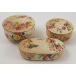 A Royal Worcester patch box and cover, decorated with flowers, dated 1904, diameter 3ins, together