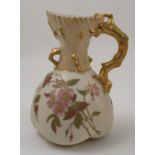 A Royal Worcester claret jug, with coral moulding, the ivory body with floral decoration, af,