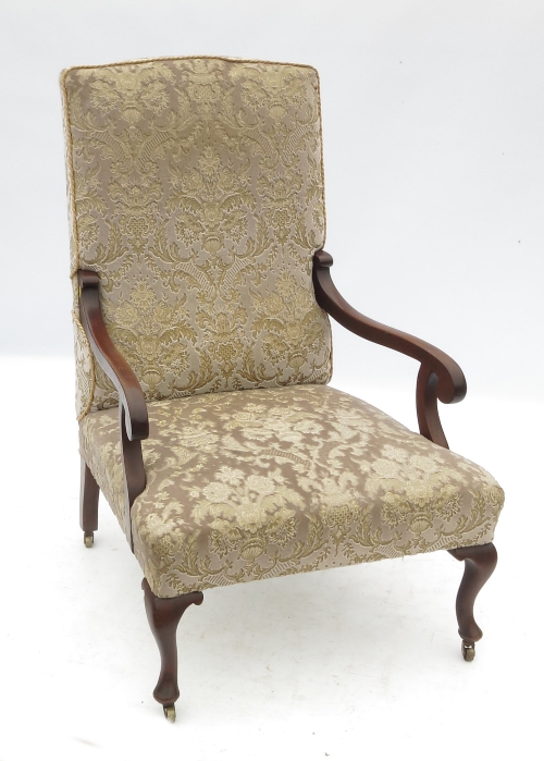 A mahogany open armchair, raised on fron