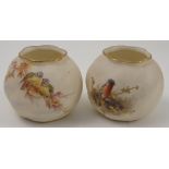 A pair of Grainger and Co wrythen moulded vases, the one decorated with two blue tits on a branch,