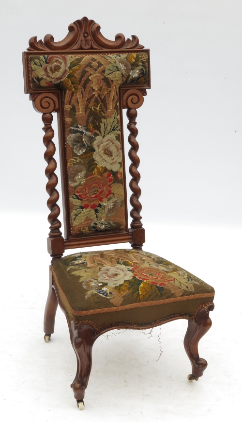 A 19th century oak prie deux chair, with