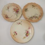 A Royal Worcester blush ivory plate, decorated with flowers to a moulded edge, dated 1901, shape