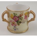 A Royal Worcester blush ivory three handled tyg, decorated with flowers, dated 1904, height 2.