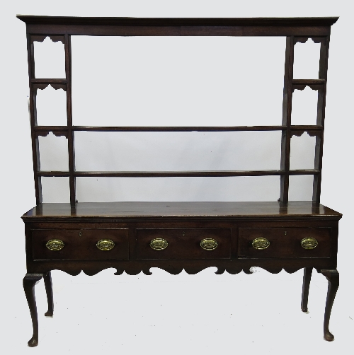 An 18th century oak dresser, with associ