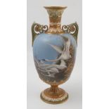 A Royal Worcester pedestal vase, the powder blue ground decorated to the front with five swans in