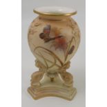 A Grainger and Co blush ivory vase, moulded with masks and decorated with butterflies and leaves, to