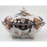 A 19th century Mason Ironstone china covered tureen, the fluted body embossed with leaves and