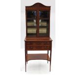 An Edwardian mahogany cheveret, with gla