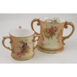 A Royal Worcester blush ivory two handled loving mug, decorated with floral sprays to the interior