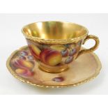 A Royal Worcester tea cup and saucer,