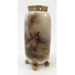 A Royal Worcester vase, decorated with a cock and hen pheasant in a landscape,