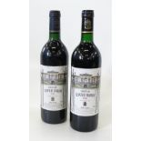 A bottle of 1962 Chateau La Mission Haut Brion Grand Cru Classe,