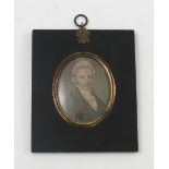 A 19th century printed portrait miniature, of a Gentleman, titled verso Chas.