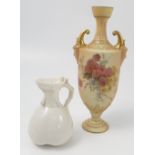 A Royal Worcester blush ivory vase, decorated with chrysanthemums, having mask handles,