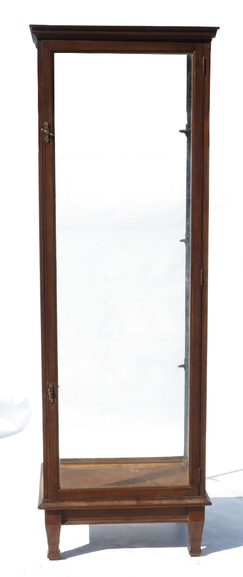 A rectangular display cabinet, with glazed door and sides, with three shelf struts, width 23ins,