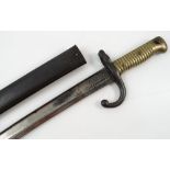 A 19th century French 1866 Sabre bayonet, the blade engraved St Etienne 1872,