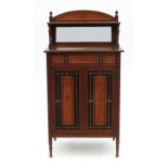An Aesthetic movement cabinet, with mirror back and shelf under,