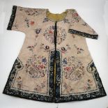 A 19th century Chinese silk and embroidered jacket,