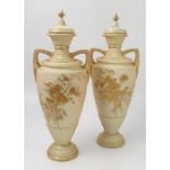 A pair of Royal Worcester gilded ivory vases, richly gilded with thistles,