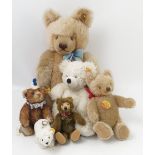 A group of modern Steiff bears, to include bear with growler, a clown bear, a bear with collar,