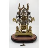 A brass skeleton clock, with fusee movement,