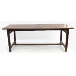 A farmhouse table, of rectangular form, with three plank top and end supports,