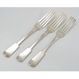 Three Scottish provincial silver fiddle pattern dinner forks, engraved with an initial,