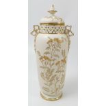 A Royal Worcester gilded ivory covered vase, with pierced neck, decorated with gilded foliage,