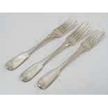 A set of six Georgian silver fiddle pattern dessert forks, engraved with a crest, London 1801,